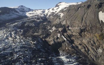 Two years after the eruption: A view upward showing the lower end of the lava flow and the glacier.